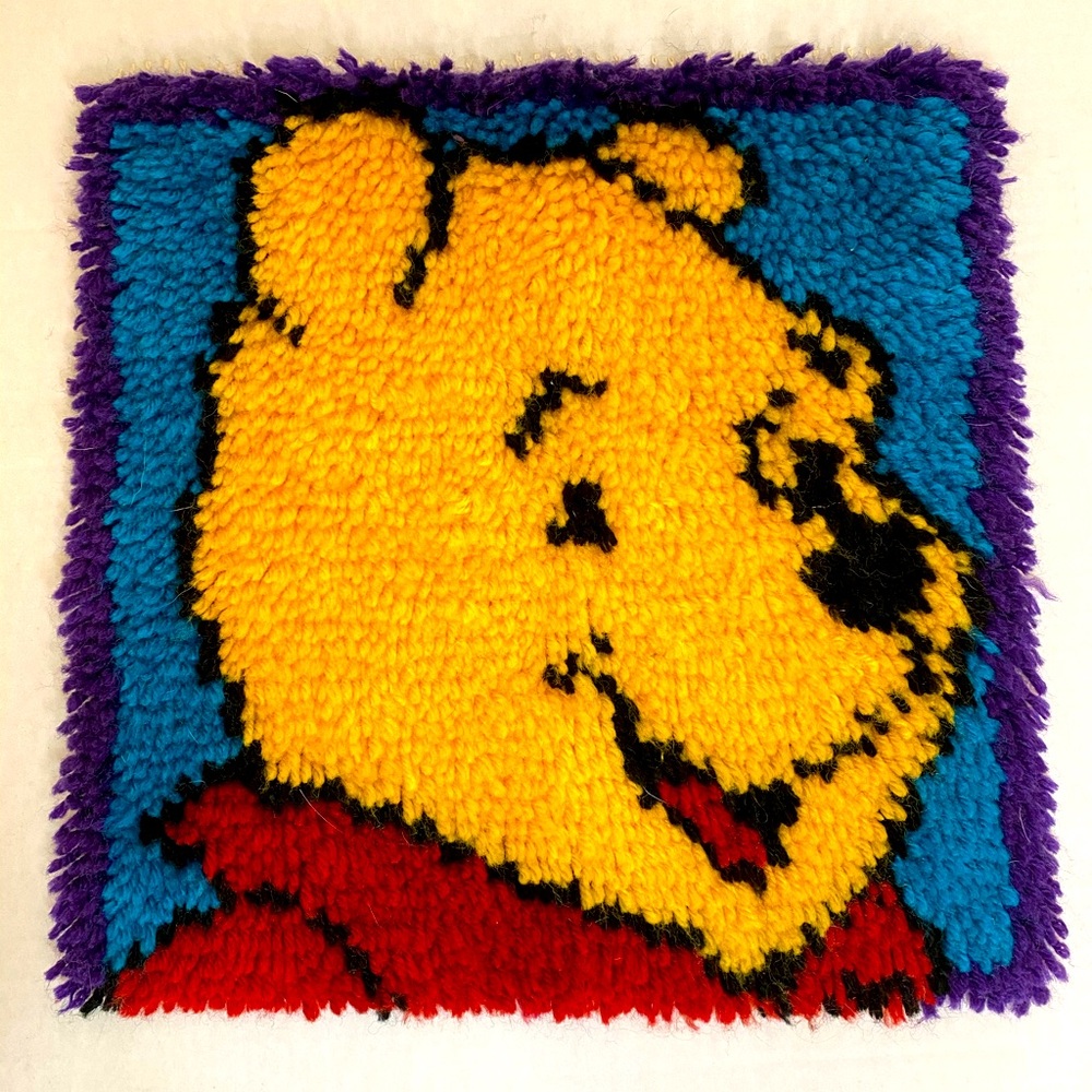 Completed Winnie the Pooh latch & hook wall hanging 13”x13”